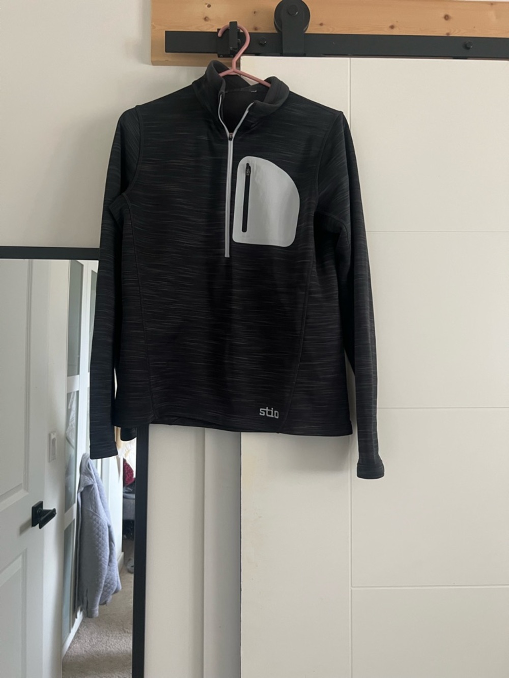 Stio Black Half-Zip Pullover with Light Gray Chest Pocket